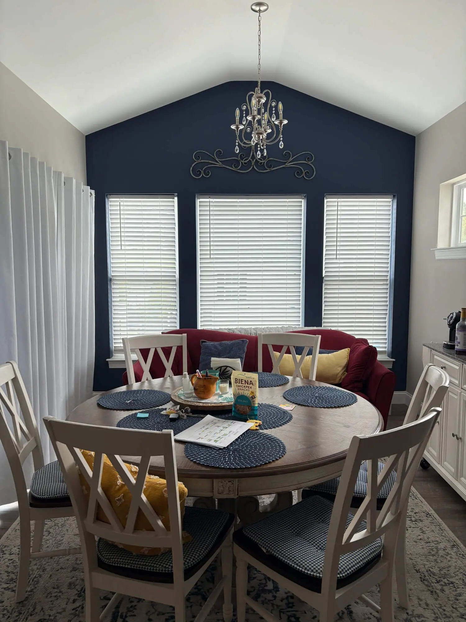 Dining area with navy blue accent wall and vaulted ceiling painted by Martzall’s Custom Surfaces serving Lititz, PA and surrounding Lancaster County communities