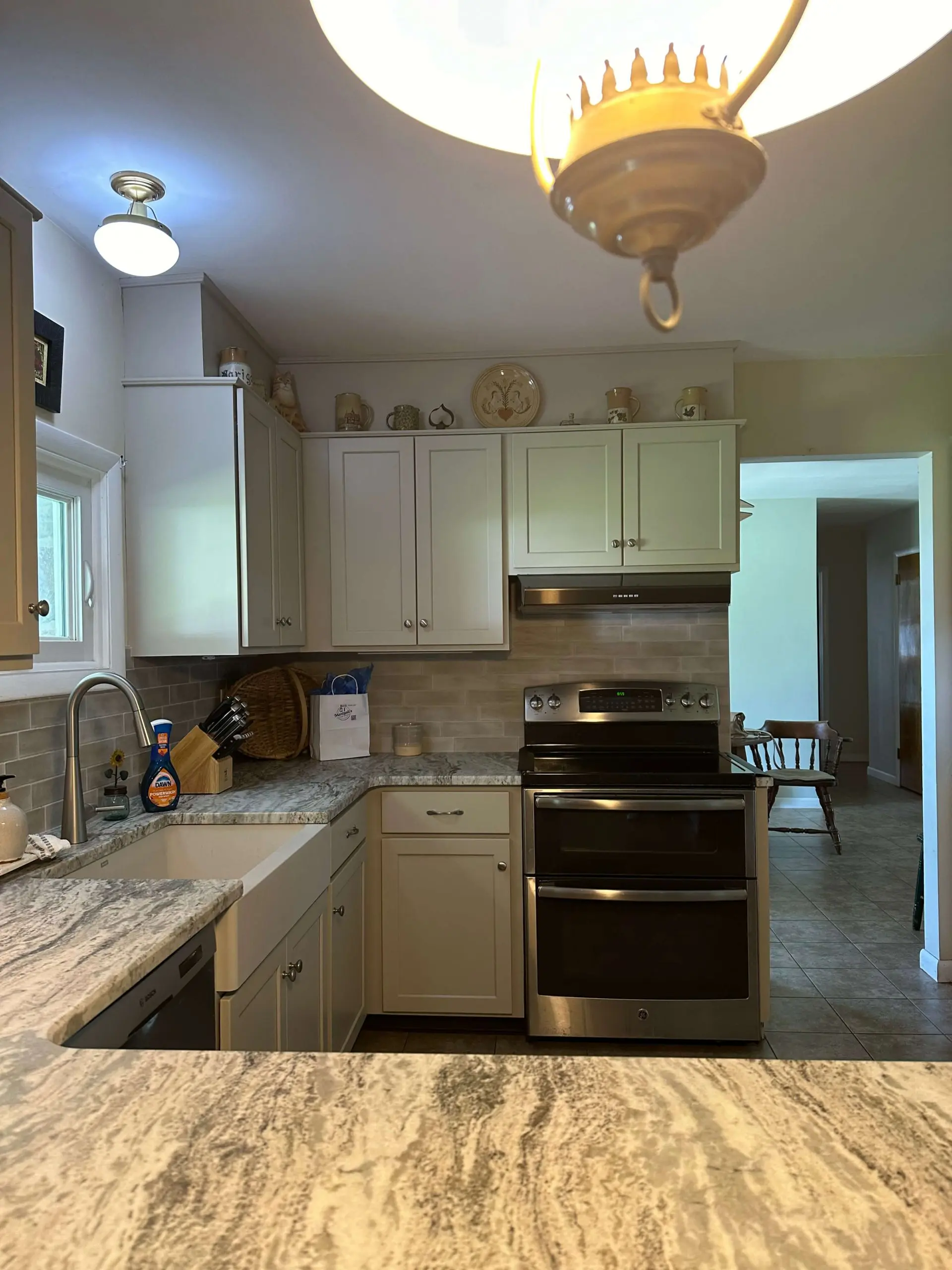Martzalls custom surface. offers professional kitchen deep cleaning services for marble countertops, stainless steel appliances, and farmhouse sinks.