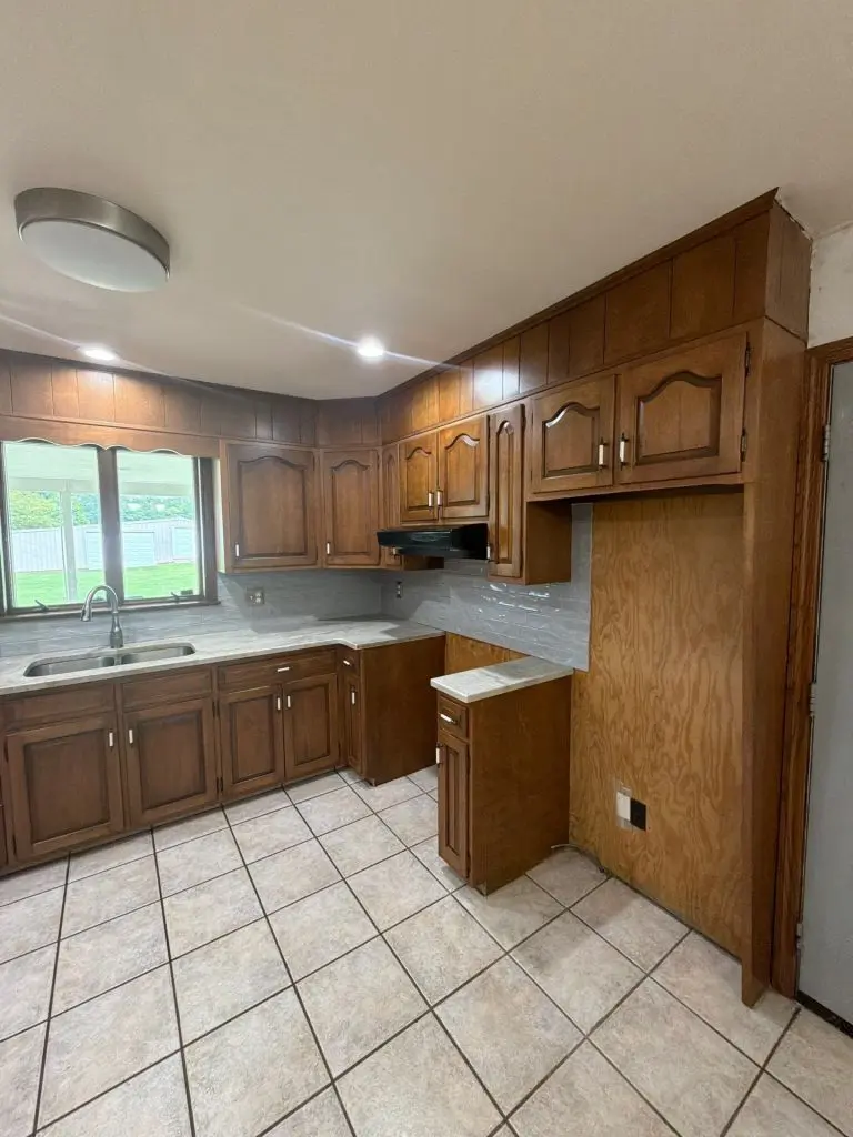Dark stained kitchen cabinets before refinishing in a Boyertown PA home