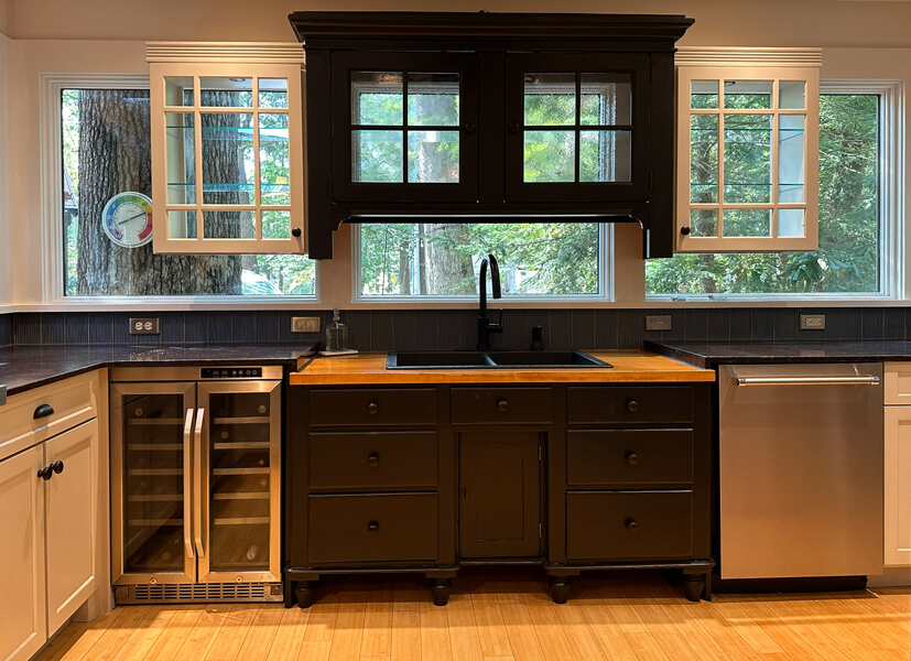 Two-tone kitchen cabinets with dark stained island and white upper cabinetry refinished by Martzall’s Custom Surfaces serving Lititz, PA and surrounding Lancaster County communities