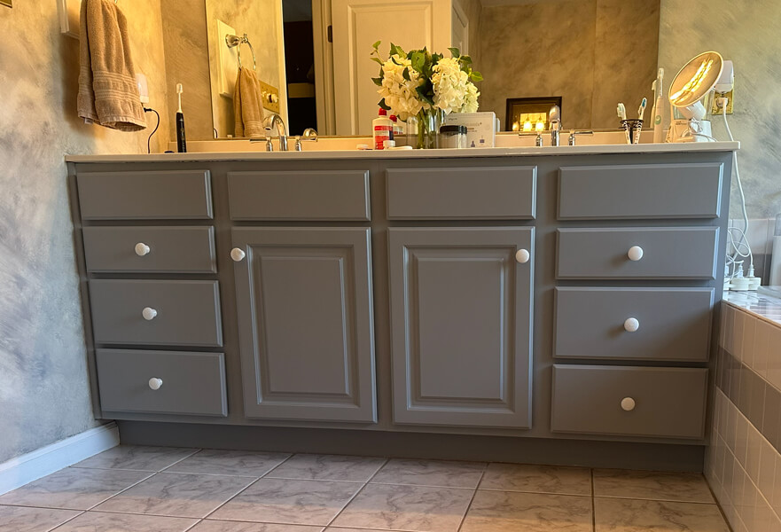 Bathroom vanity cabinet refinishing in soft gray completed by Martzall’s Custom Surfaces serving Lititz, PA and surrounding Lancaster County communities