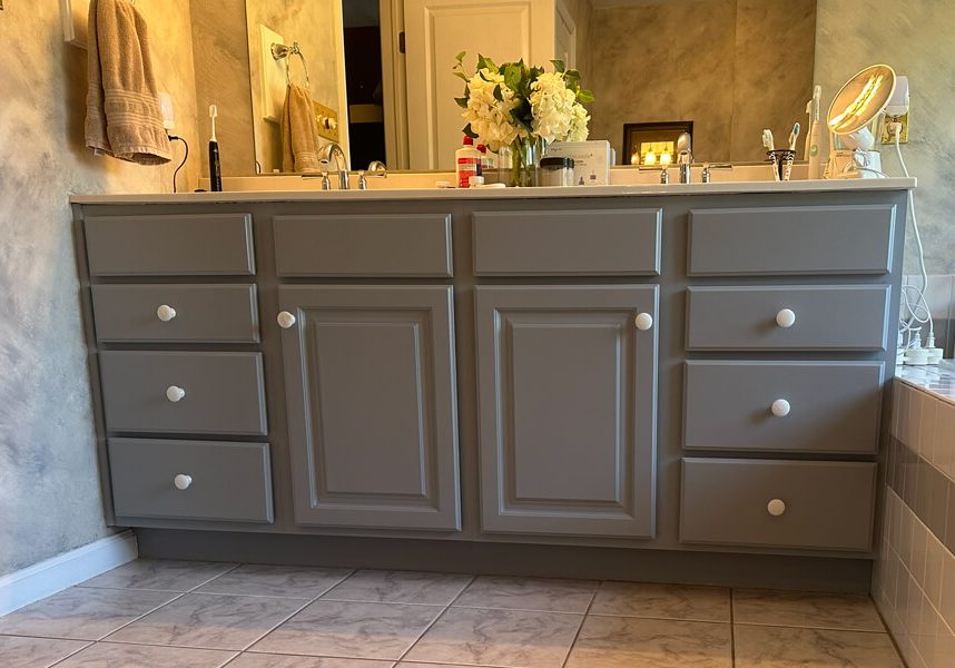 Bathroom vanity cabinet refinishing in soft gray completed by Martzall’s Custom Surfaces serving Lititz, PA and surrounding Lancaster County communities